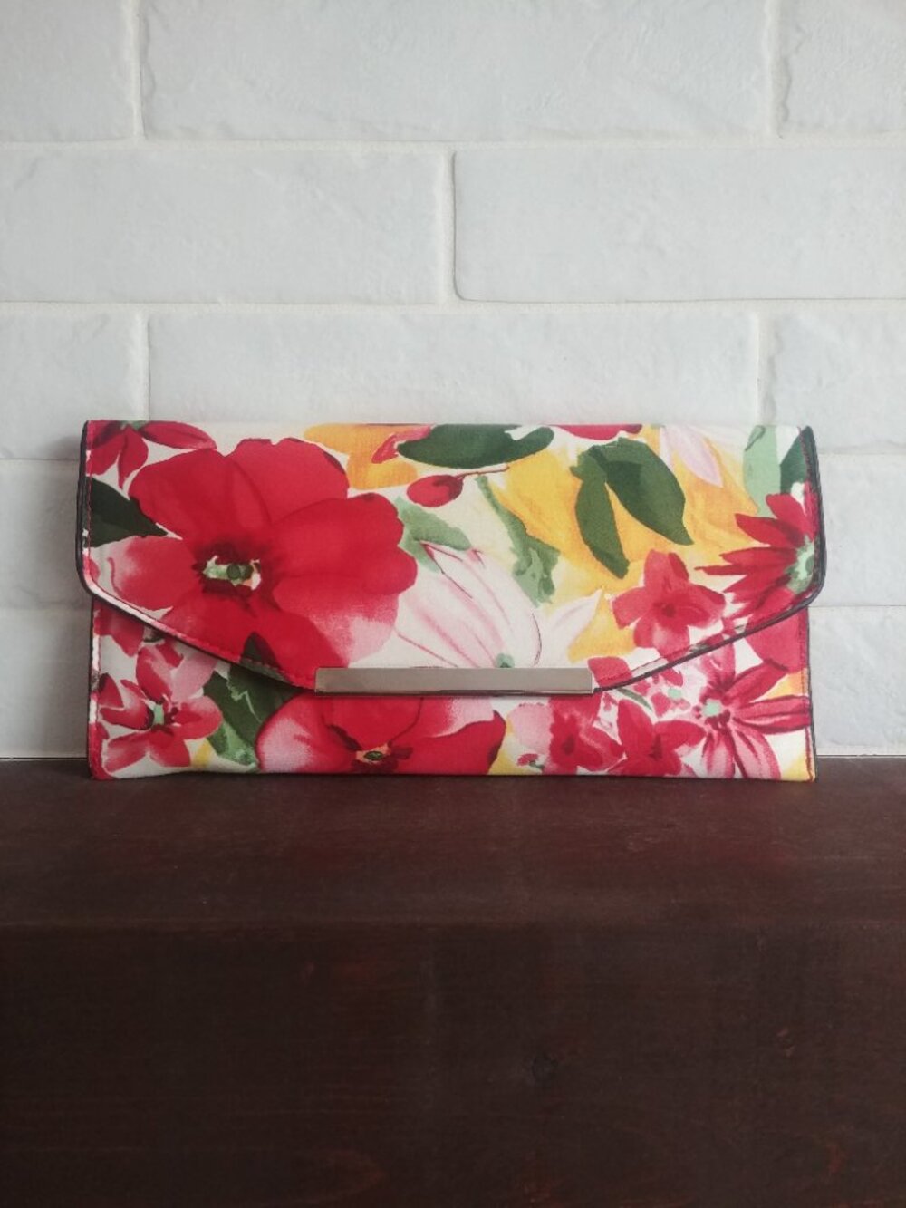 Le Chateau large fabric clutch red yellow green flowers